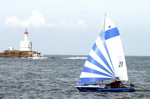 Blue & White Magnum 21 Trimarans, day boat with Blue & White Striped Gennaker
