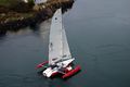 Magnum 21S departing from the 
Ria d'�tel under Pont Neuf
sailing in virtually zero wind.