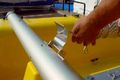 Put the mast onto the hinged pin
whilst in the horizontal position.